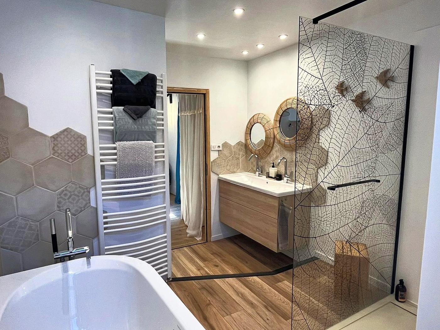 The bath in La Mercantine and its heated towel rail