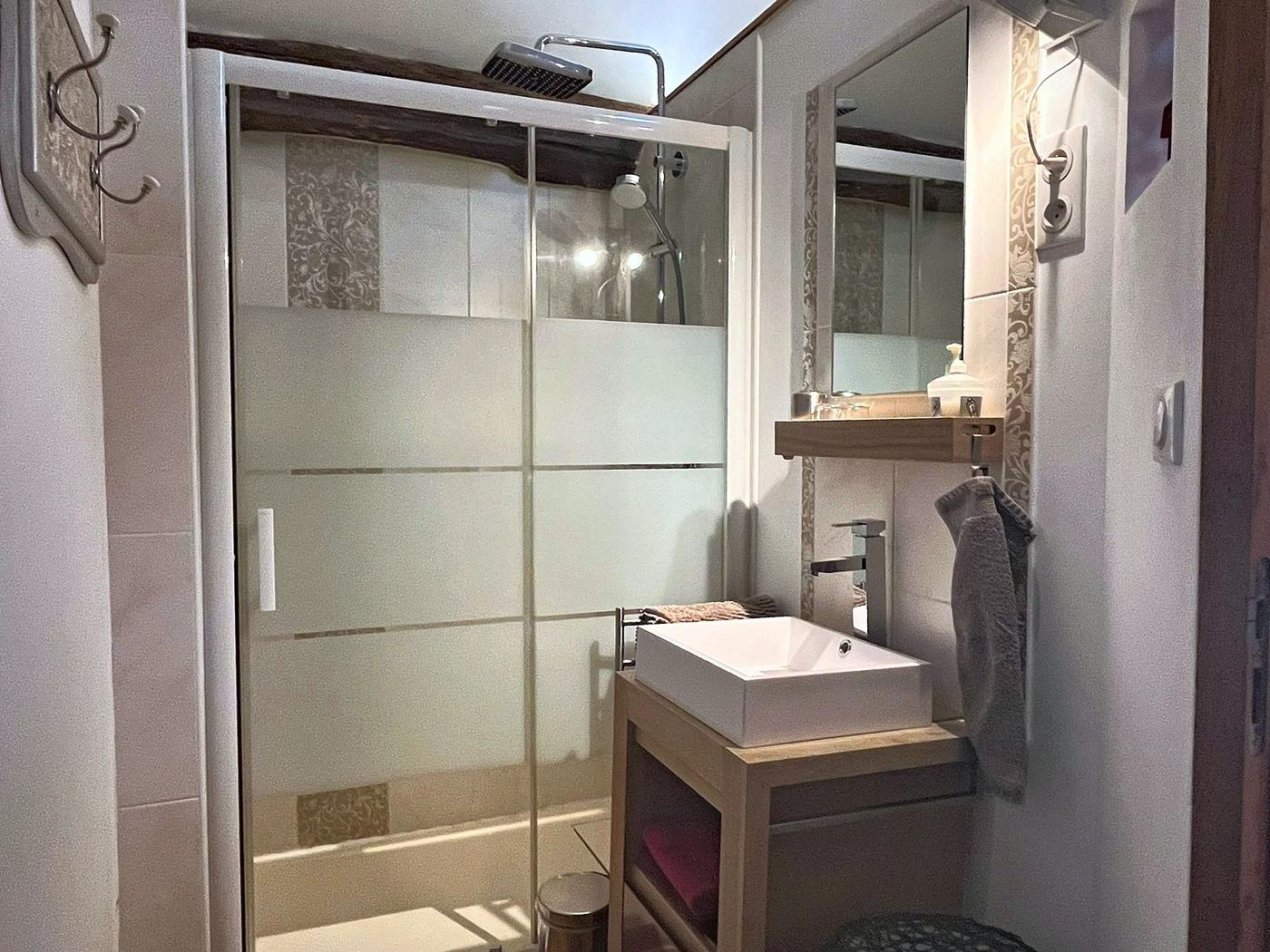 The shower and basin in the Le Colombier bathroom