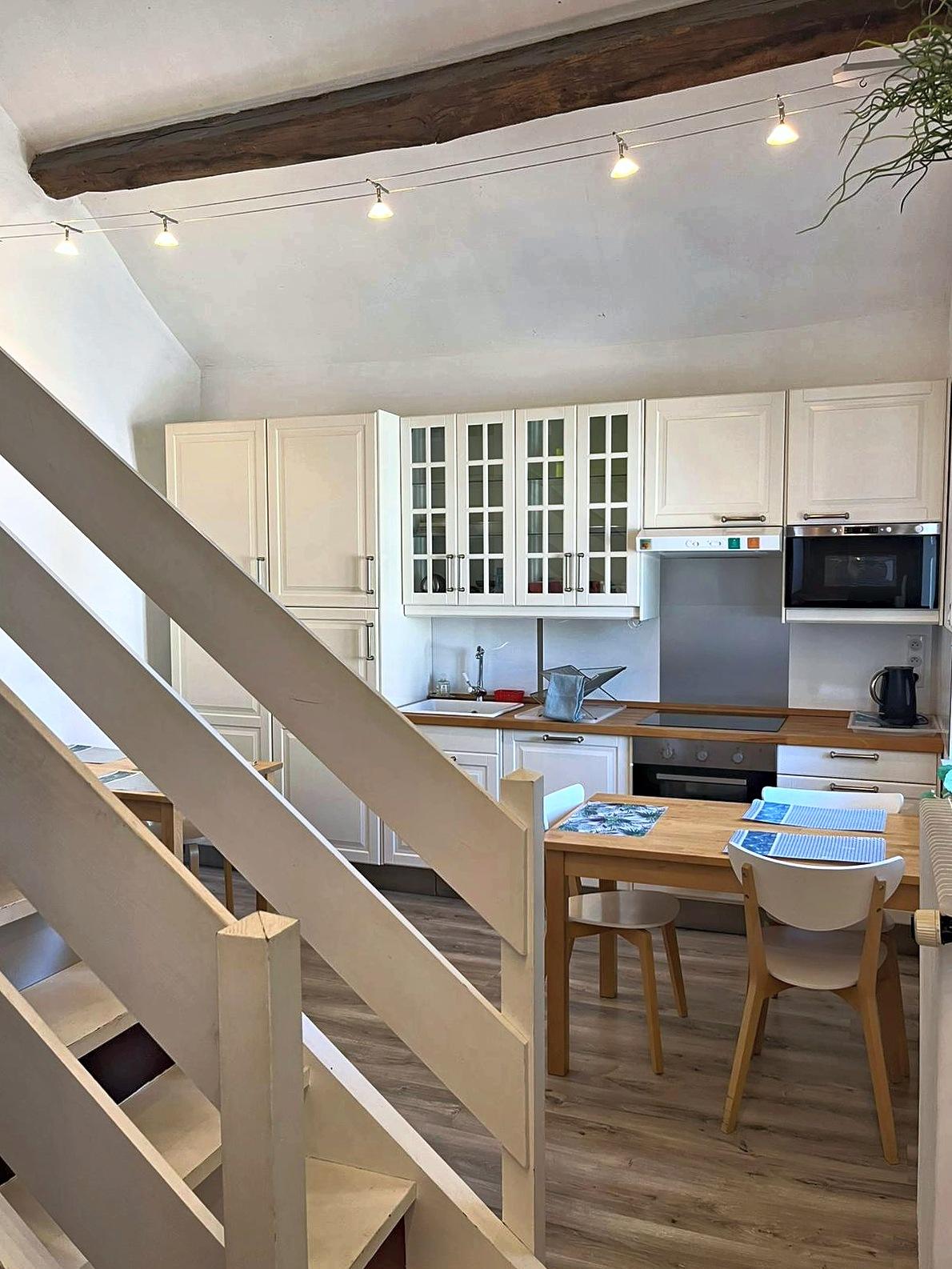 The second kitchen on its half-landing, seen from the stairs