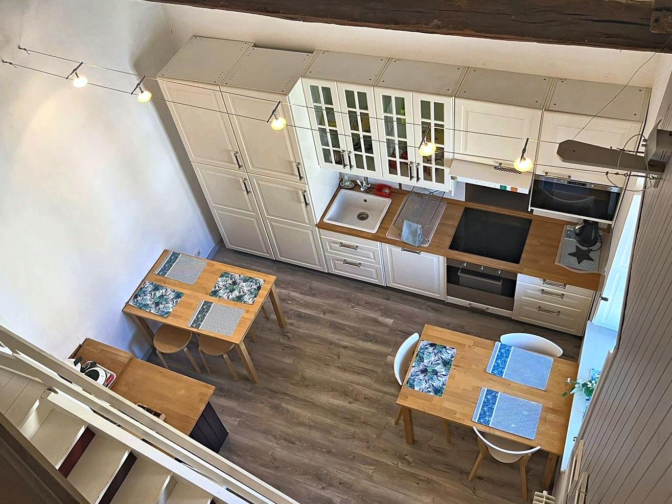 The second kitchen from above, with its games table