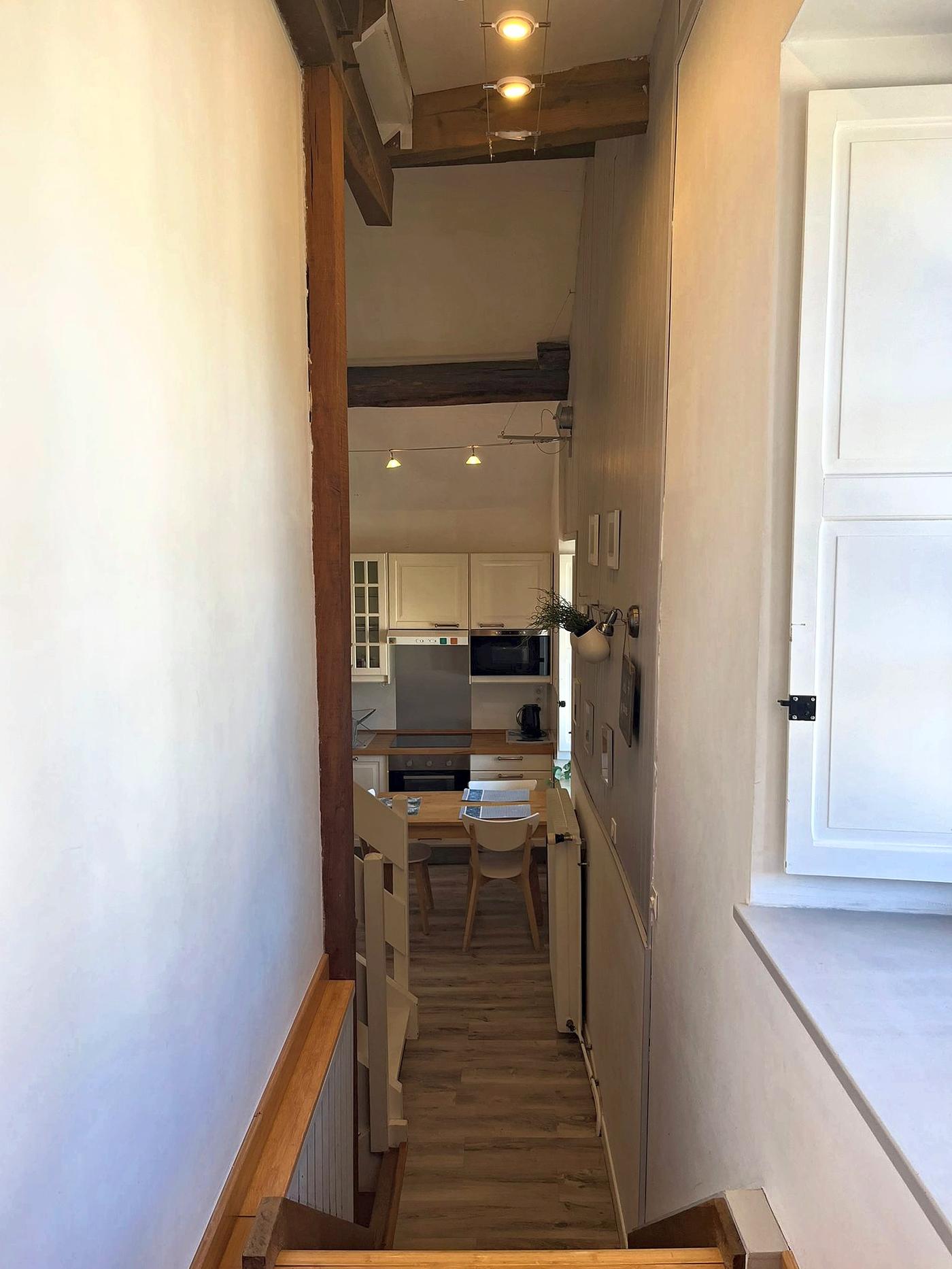 The staircase down to the second kitchen