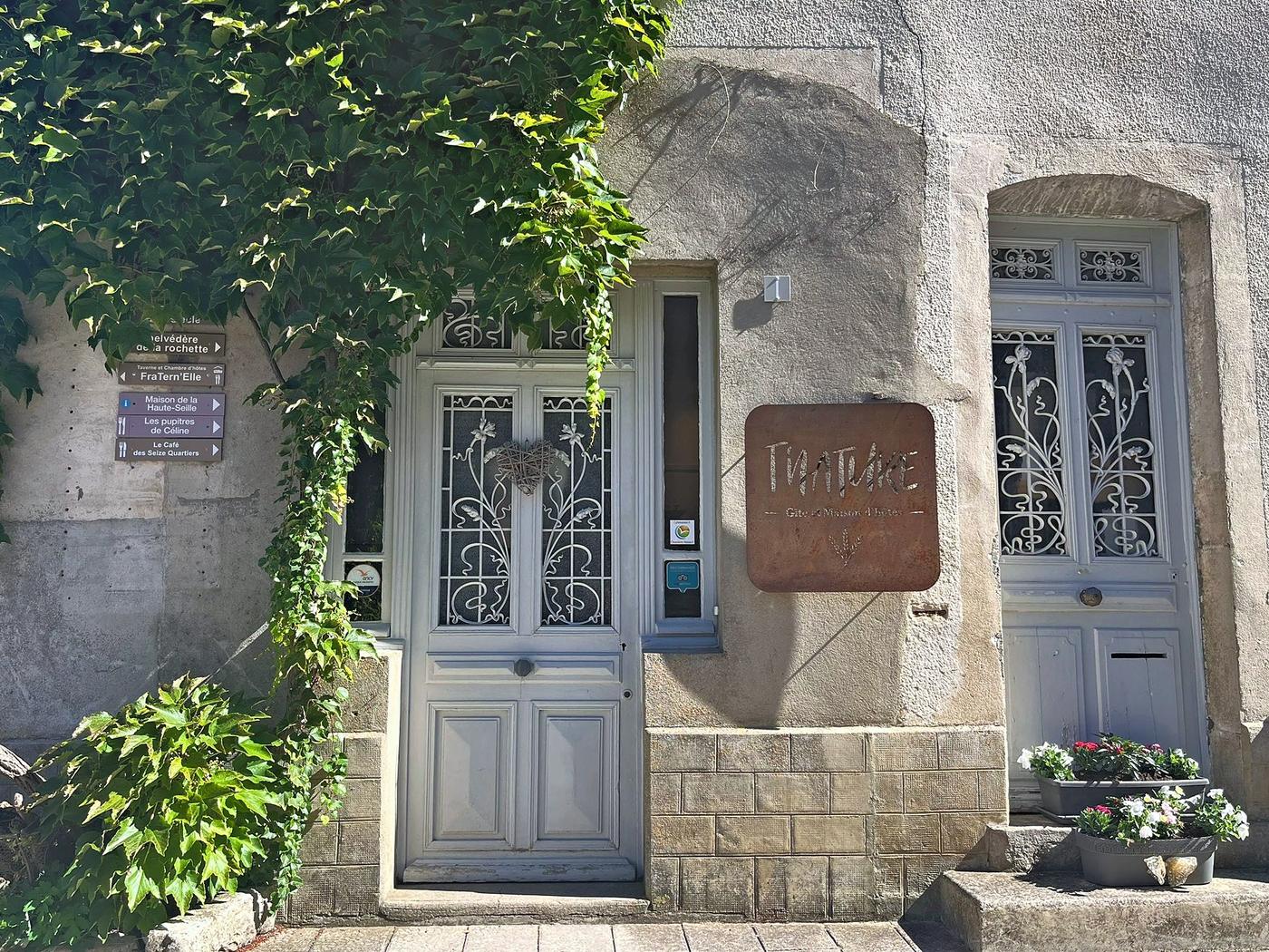 The front of the old butcher’s shop and its bell-fitted door