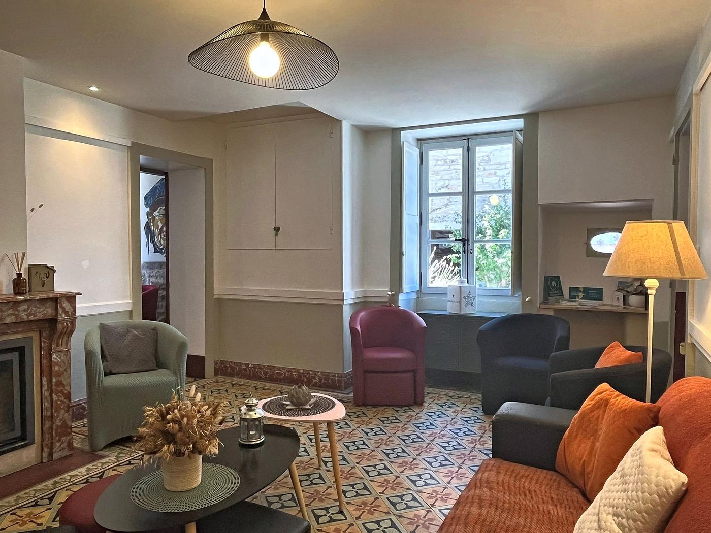The sitting room seen from the entrance hall, with its window onto the street